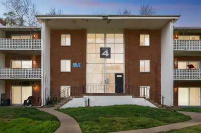 a brick building with the number four on it at Historic Charm Meets Modern Comfort The Chateau in Wilmington