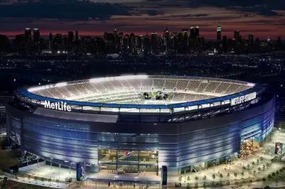 a rendering of a soccer stadium at night at Comfy Cozy retreat - NYC & NWK w free parking in Bayonne