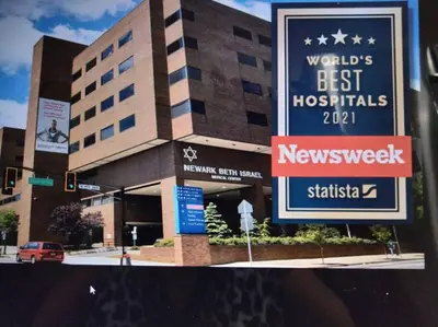 a building with a sign for a newcastle hospital at Hollywood in East Orange