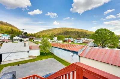 an aerial view of a small town with mountains at Loganton Townhome, Near Fly Fishing and Hiking! in Loganton