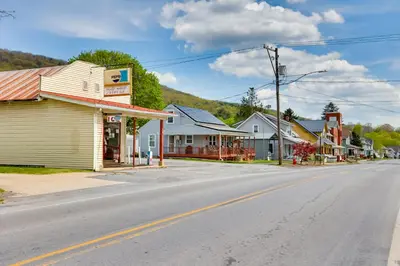 an empty street in a small town at Loganton Townhome, Near Fly Fishing and Hiking! in Loganton