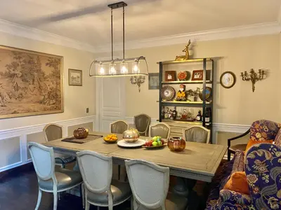 a dining room with a table and chairs at House in Bucks County in Perkasie