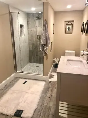 a bathroom with a shower and a sink at House in Bucks County in Perkasie
