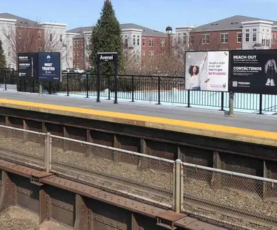 a train station with a platform and train tracks at Private 2-bedroom house, free parking, 15-min walk to direct NYC Manhattan train, MetLife Stadium FIFA World Cup 30 minutes away in Edgar