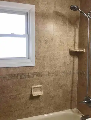 a bathroom with a shower with a window and a sink at Private 2-bedroom house, free parking, 15-min walk to direct NYC Manhattan train, MetLife Stadium FIFA World Cup 30 minutes away in Edgar