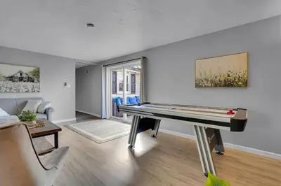 a living room with a pool table in it at Nature Haven Pond,Pool and Hot Tub in Myerstown