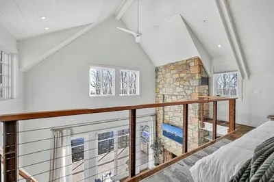 a room with a fireplace in a house at The Roundtop Chalet romantic couples getaway in Wrightsville