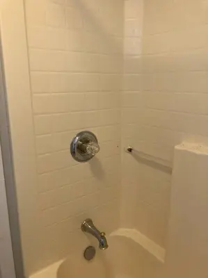 a bathroom with a shower with a toilet and a sink at Private 2-bedroom apartment, free parking, direct bus to NYC Manhattan only 2 blocks away, MetLife Stadium FIFA World Cup 25 minutes away in Linden