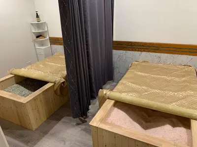 two beds in a room with black curtains at Sunny Home in Sunbury