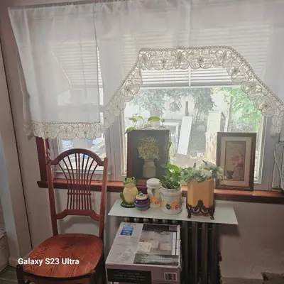 a window with a table and a chair in a room at HARPER AVE King Bed with Private Bathroom, FREE PARKING in Irvington