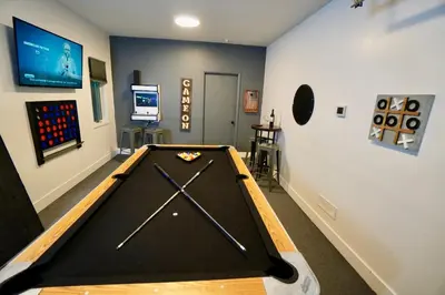 a billiard room with a pool table in it at Poconos Oasis with Game Room in Pocono Summit