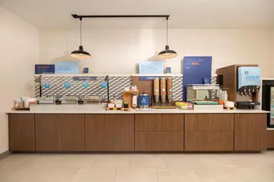 a store with a counter in a storeasteryasteryasteryasteryasteryasteryasteryastery at Holiday Inn Express Frackville Hotel By IHG in Frackville