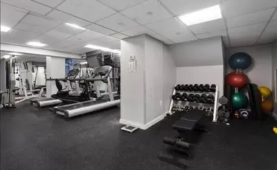 a gym with lots of exercise equipment and balloons at 73-410 Luxury 24 DM New Studio UWS Gym Laundry in New York