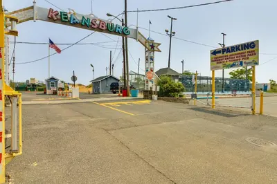 an empty gas station with a sign that reads kennett pumping at Cozy Keansburg Cottage Walk to Beach and Boardwalk! in Keansburg