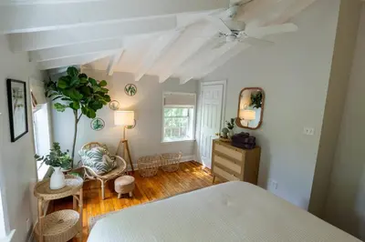 a bedroom with a bed and a ceiling fan at Historic Family 3BR Trinity in the Heart of Philly in Philadelphia
