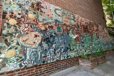 a building with a wall covered in graffiti at Historic Family 3BR Trinity in the Heart of Philly in Philadelphia