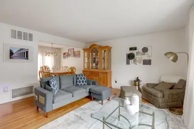 a living room with a couch and a chair at Somerset Home with Large Yard Near Parks and Trails in Somerset