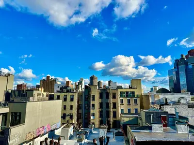 a view of a city skyline with buildings at Luxury in Little Italy 2 Bedroom Private Balcony in New York