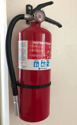 a red fire hydrant is attached to a wall at Spacious and private apartment with 3 bedrooms and 1 bathroom near Newark International Airport EWR and New York City, MetLife Stadium FIFA World Cup 20 minutes away in Newark