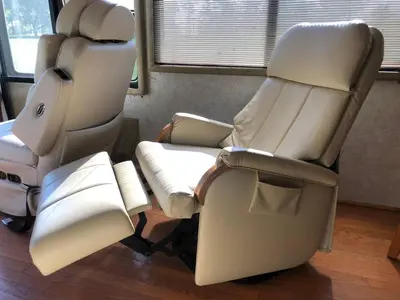 a couple of chairs sitting in a room at Private 1-bedroom RV, direct bus to NYC Manhattan only 2 blocks away, MetLife Stadium FIFA World Cup 25 minutes away in Linden