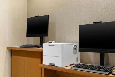 a computer monitor and a printer on a desk at SpringHill Suites by Marriott Easton PA in Easton