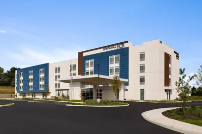 an office building with a blue and white building at SpringHill Suites by Marriott Easton PA in Easton