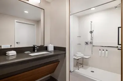 a bathroom with a sink and a shower at Fairfield by Marriott Inn & Suites Bethlehem PA in Bethlehem