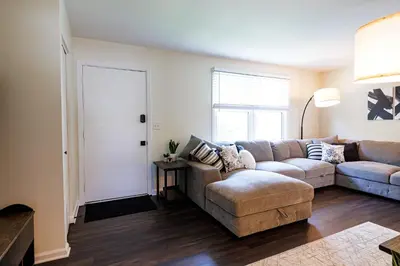 a living room with a couch and a table at The Cooper Home, Dogs Welcome! in Ephrata