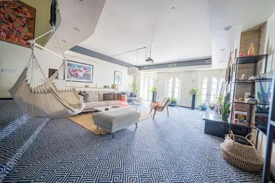 a living room with a hammock in the middle of the room at Private Gramercy TownHouse 3BR 3BA with Terrace in New York