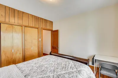 a bedroom with a bed and a desk at 5 Mi to Hersheypark Family Home with Game Room in Annville