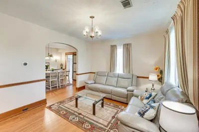 a living room with a couch and a table at 5 Mi to Hersheypark Family Home with Game Room in Annville