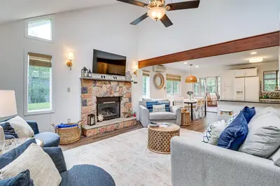 a living room with couches and a fireplace at Spacious Family Retreat Pocono Home with Deck in Albrightsville