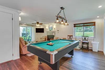 a living room with a pool table in it at Spacious Family Retreat Pocono Home with Deck in Albrightsville