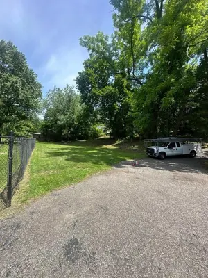 a car parked in a parking lot with a trailer at Beautiful River front home with private pool in Phillipsburg