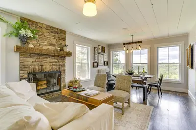 a living room with a couch and a fireplace at Lovely Country Retreat, 4 Mi to Dtwn Narrowsburg! in Narrowsburg