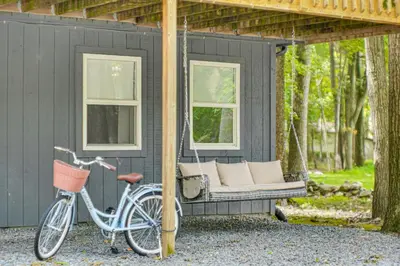 a bike parked in front of a black shed at Private Hot Tub Tree-Lined Poconos Home! in Pocono Summit