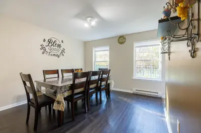 a dining room with a table and chairs at Mohawk-Kudil in Poconos ! Private Pool-Hot Tub-Lake Access-Game Room in Albrightsville