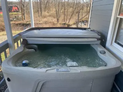 a jacuzziificialificialificialificialificialificialificialificialificialificialificial at Old farmhouse with Hot tub in the Finger Lakes in Horseheads