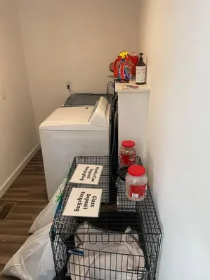 a refrigerator with a shelf in a room with a refrigerator at Old farmhouse with Hot tub in the Finger Lakes in Horseheads