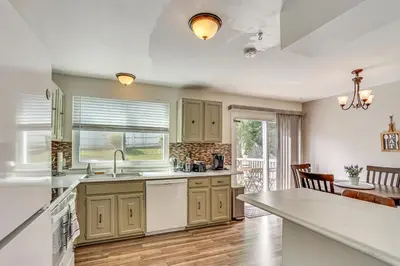 a kitchen with a sink and a counter top at 5 Mi to Downtown Harrisburg - Family Home! in Harrisburg