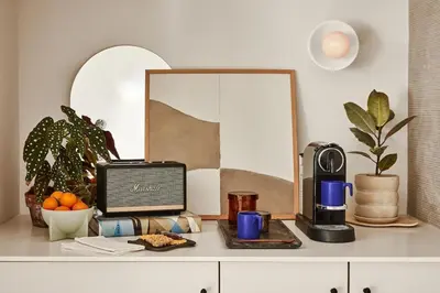 a counter top with a coffee maker and a blender at Archway Hotel Residence in Philadelphia