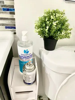a plant sitting on top of a toilet in a bathroom at Private Room A-KING BED-12Mints NYCity Times Square in West New York