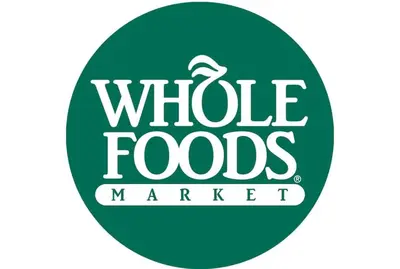 a green and white sign with the words whole foods market at 2 Days Stay Get 40 percent OFF for, Sleeps 6 & 2 Queen in Newark