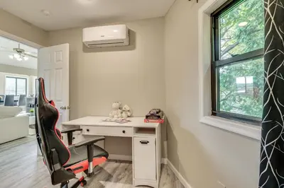 a home office with a desk and a chair at Modern Harveys Lake Apartment with Beach Access! in Harveys Lake