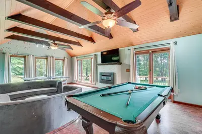 a pool table in a living room with a ceiling at Game Room and Private Yard Family Gem in Kunkletown in Effort