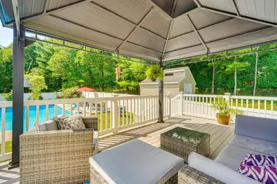 a patio with a couch and chairs on a deck at Game Room and Private Yard Family Gem in Kunkletown in Effort
