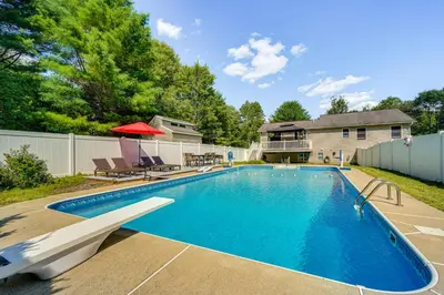 a swimming pool in the backyard of a house at Game Room and Private Yard Family Gem in Kunkletown in Effort