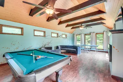 a pool table in a living room with a ceiling at Game Room and Private Yard Family Gem in Kunkletown in Effort