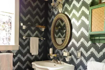 a bathroom with a sink and a mirror at Ulster County Farmhouse Near Waterfalls and Winery! in Pine Bush