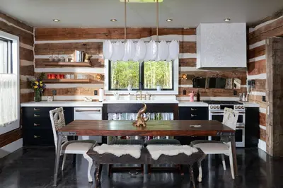 a kitchen with a table and chairs in a room at Grill and Fire Pit Eclectic Ulster County Cabin in Pine Bush